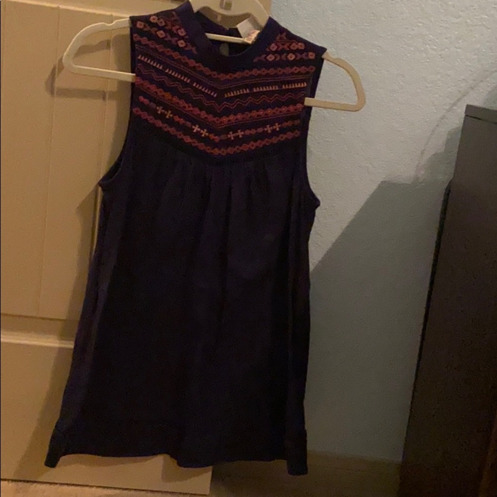High neck sleeveless navy shirt